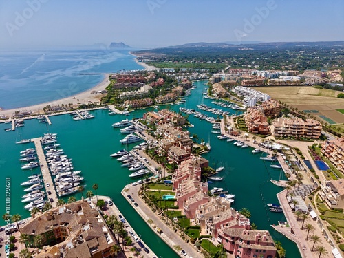 aerial view of Sotogrande, marina with boats and yachts, Rock of Gibraltar and Africa at the horizon, San Roque, Torreguadiaro, Costa del Sol, Cádiz, Andalusia, Malaga, Spain