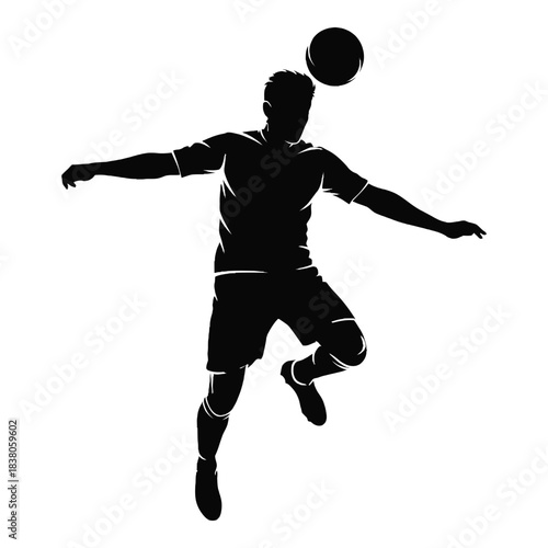 Silhouette of a soccer player skillfully heading the ball in action