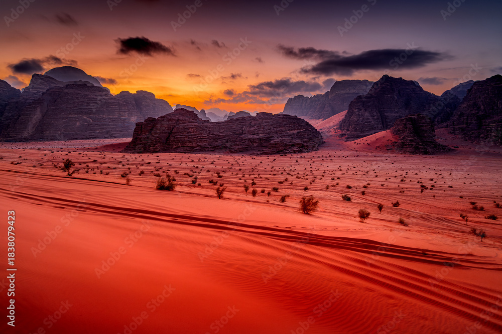 Fototapeta premium Wadi Rum at sunrise with mountains. Desert landscape of Jordan.
