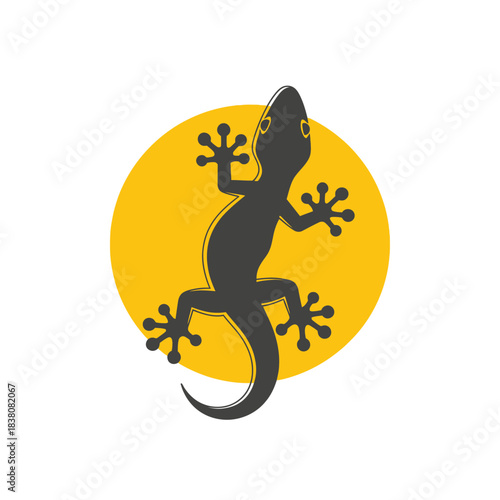 Silhouetted gecko climbing a sunlit sphere symbolising reptile adaptability and nature's allure