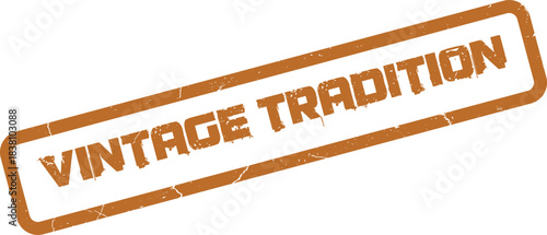 A rectangular distressed rubber stamp impression displaying the timeless words Vintage Tradition in rust color