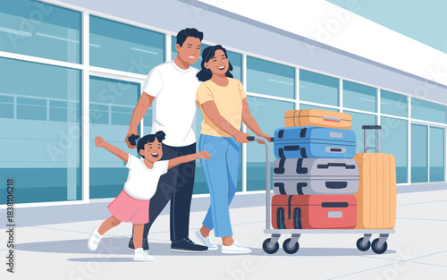 Family with luggage arriving at airport terminal