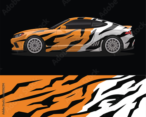 Stylish sports car livery with a bold, dynamic abstract orange and black pattern
