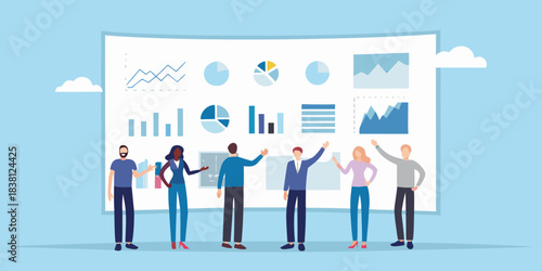 Team collaborating on a large presentation board with charts and data analysis
