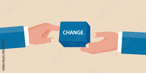 Hands connecting puzzle pieces one marked with the word change