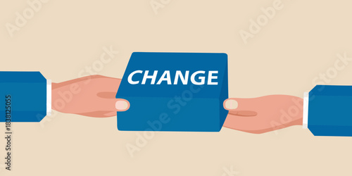 Hands exchanging a blue card with the word change written on it