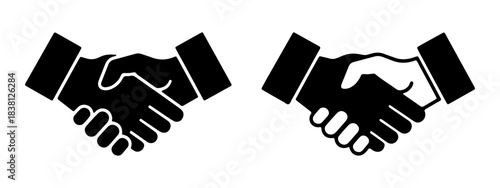 Two black silhouette icons of hands shaking, representing a handshake or agreement.
