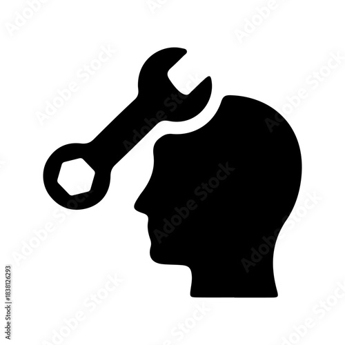 A black silhouette icon of a human head with a wrench, symbolizing problem-solving or mental maintenance.