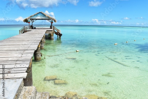 The iconic thatch-roofed jetty at Pigeon Point Heritage Park om the Caribbean island of Tobago