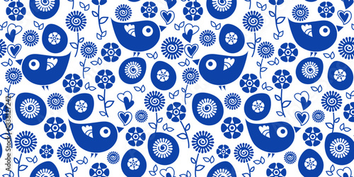 Happy Easter seamless pattern. Blue birds with flowers and eggs. Playful joyful folk nordic floral motif. Textile, wrapping, wallpaper, kids decor concept. Flat vector illustration.