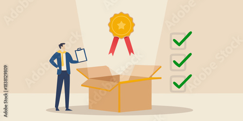 A man presenting a quality award emerging from an open cardboard box