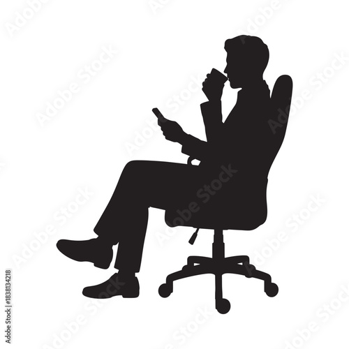 Silhouette of a man sitting in a chair with a drink and phone