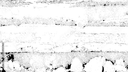 Abstract black and white gritty grunge texture overlay with noise for a distressed vintage background