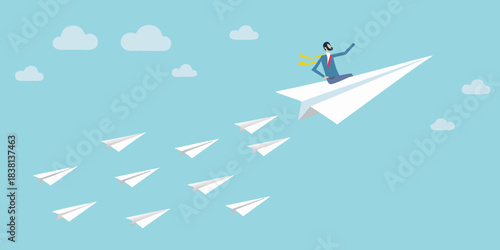 A businessman soaring through the sky on a paper airplane leading the way