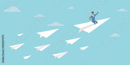 A businessman flies on a paper airplane amidst a trail of others