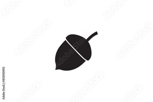 Minimalist acorn nut silhouette icon with stem and cap natural autumn forest symbol on white background