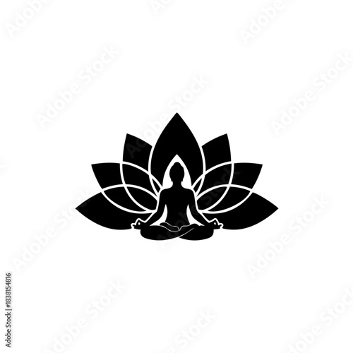 Silhouette of a person meditating in lotus position in front of a large lotus flower