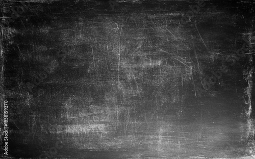Chalk rubbed out on blackboard background. 