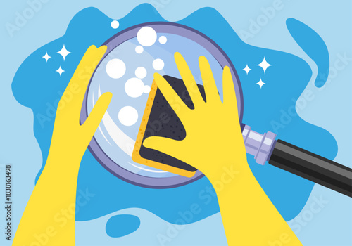 Hands in a yellow rubber gloves with cleaning sponge washing a Magnifying Glass on a blue background.