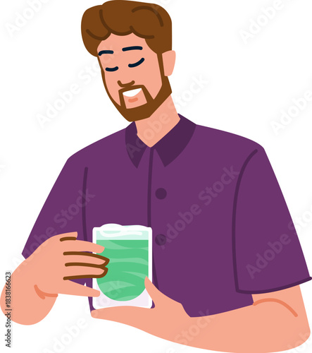 Man holding refreshing green detox smoothie drink