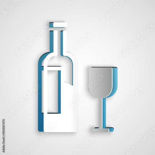 Paper cut Wine bottle with glass icon isolated on grey background. Paper art style. Vector