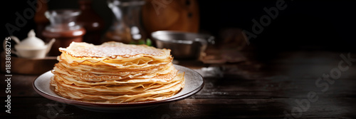 Close up of a stack of crepes (french pancakes) on a plate with copy space, Chandeleur celebration header