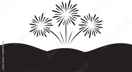 Black fireworks exploding over dark hills explosion