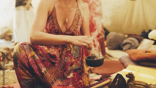 Spiritual healing ceremony, Mystical gathering with aromatic incense, Cleansing ritual held in tipi.