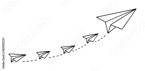 Origami paper airplanes creating a path upward for success and growth representing progress and ambition in business or personal journeys