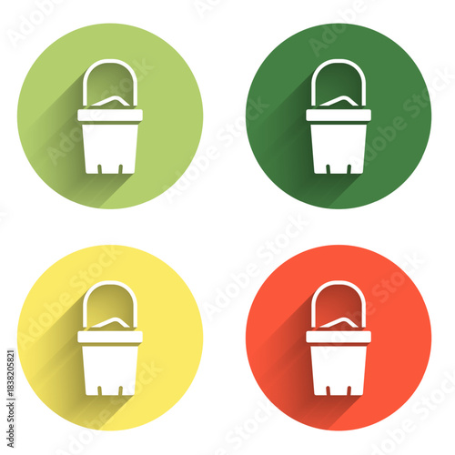 Set Sand in bucket icon isolated with long shadow background. Plastic kid toy. Summer icon. Color circle button. Vector