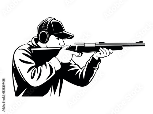 A person wearing headphones and a cap aims a shotgun, focusing on the target during a shooting sport.