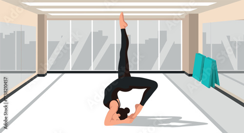 Modern yoga studio with woman practicing advanced pose in bright room