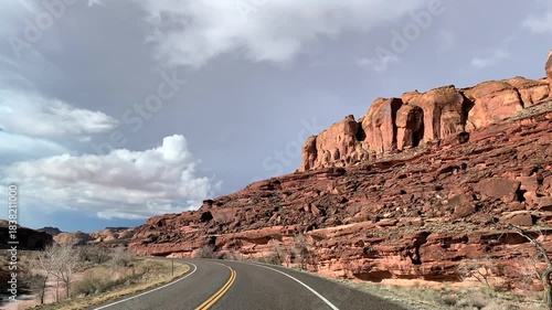 POV road trip through Utah and Arizona along Route 12 and Highway 95, with scenic canyons, mesas, red rocks and desert landscapes. Horizontal and vertical footage.