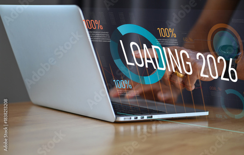 Businessman Pointing at Loading 2026 — Future Data and Information Update Concept