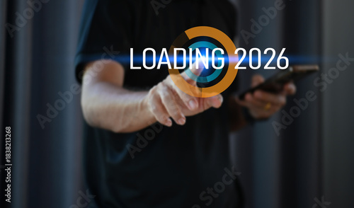 Businessman Pointing at Loading 2026 — Future Data and Information Update Concept