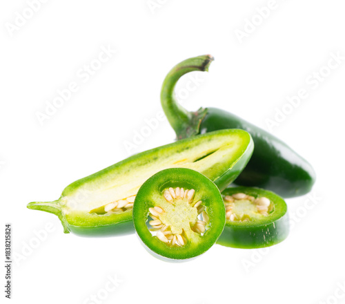 Fresh jalapeno pepper isolated on white background. Slices of green hot serrano pepper. Clipping path.