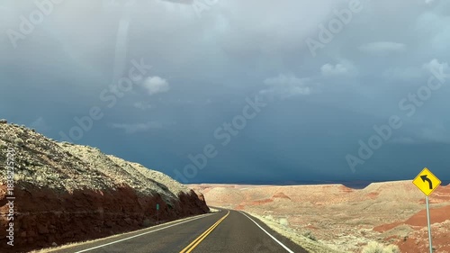 POV road trip through Utah and Arizona along Route 12 and Highway 95, with scenic canyons, mesas, red rocks and desert landscapes. Horizontal and vertical footage.