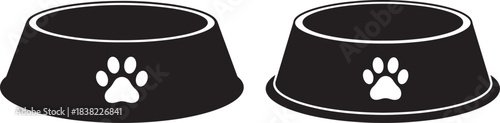 Two empty pet food bowls with paw prints silhouette