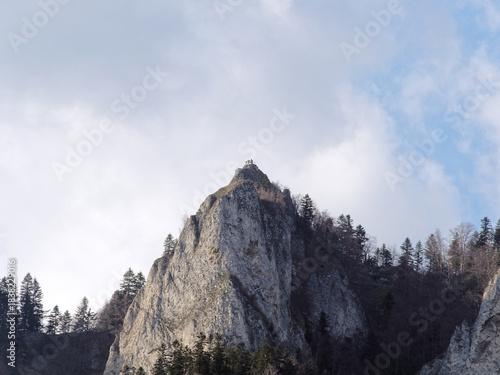 Sokolica peak with people on the top, Pieniny Mountain, Poland. Pieniny National Park. View from Dunajec River Gorge