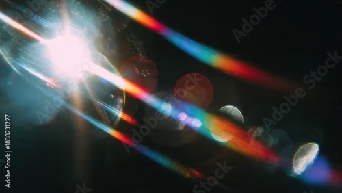 Intense analog lens flare effect with vibrant rainbow spectral streaks and bright light source anomaly, perfect cinematic overlay texture on dark background.