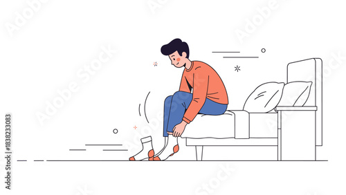 Young caucasian male putting on socks on bed in minimalist room