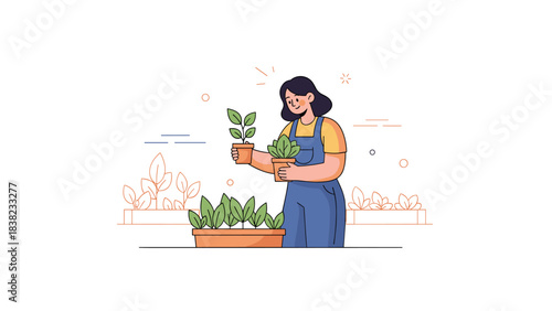 Female asian young adult gardening with potted plants in overalls
