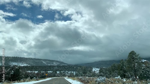 POV road trip through Utah and Arizona along Route 12 and Highway 95, with scenic canyons, mesas, red rocks and desert landscapes. Horizontal and vertical footage.