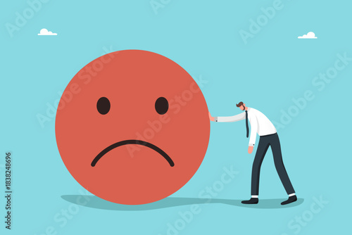 Lack of strength or energy for productive work, emotional burnout or fatigue, loss of inspiration, slow ratings and negative consumer reviews, а tired man leans his hand on a large disgruntled emoji.