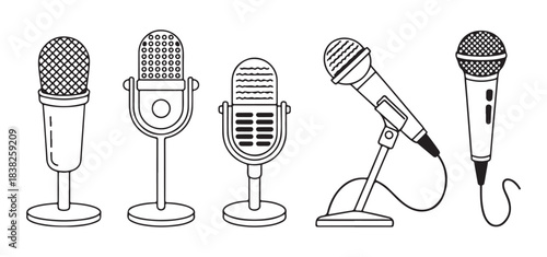 Collection of various colored vintage and modern microphones for audio recording