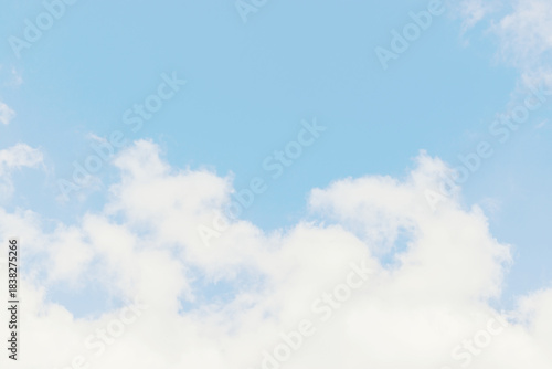 Beautiful blue sky with light white cloud background, dancer overcast. Demonstrating color, trend 2026 year