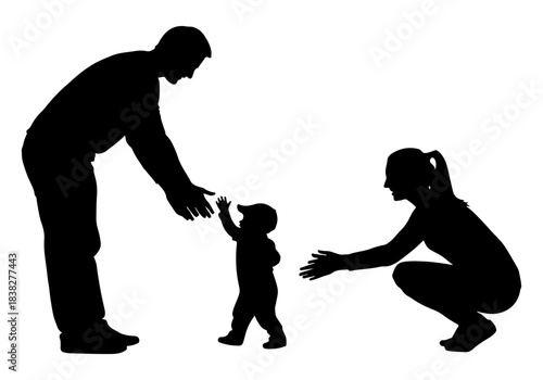 A happy family silhouette of parents supporting their child as they take their first steps
