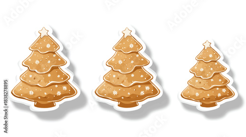 Gingerbread Christmas tree cookies in three sizes with white icing details and a star on top, festive holiday baking treat.