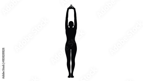 Silhouette of a person performing a yoga pose with hands overhead