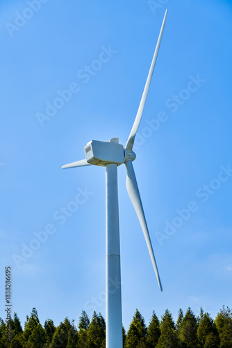 Wind power station under the blue sky